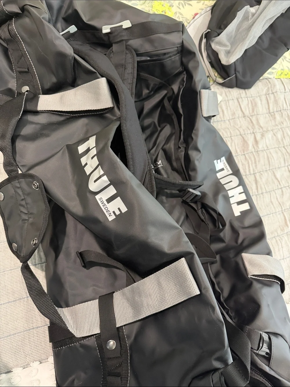 Thule Chasm Duffle 130L Black Travel Duffle with Gray Mesh Pocket